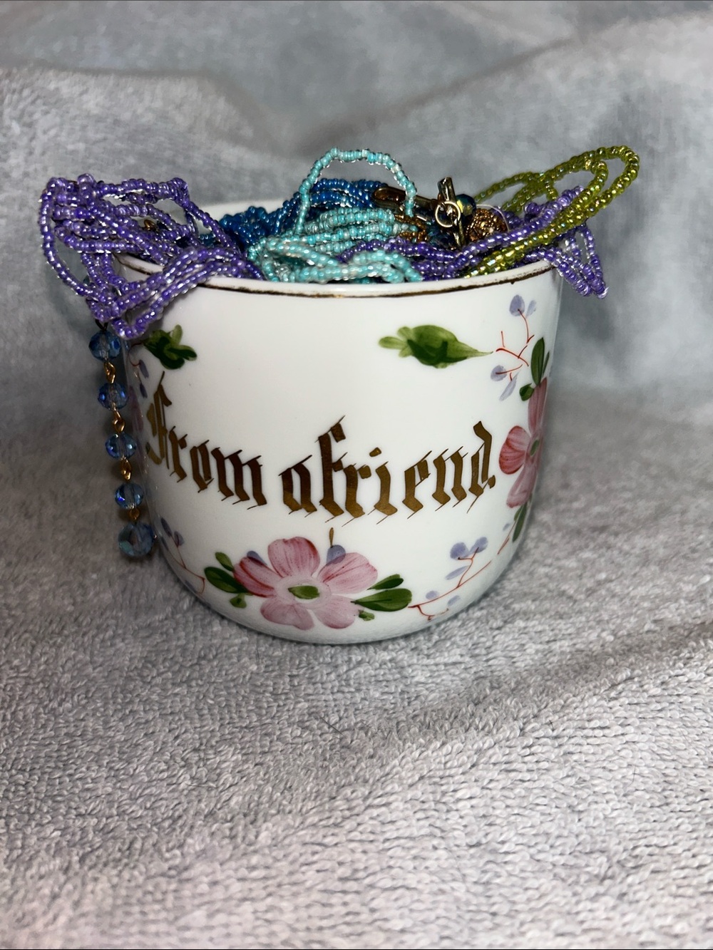 Vintage Porcelain Floral Cup of jewelry